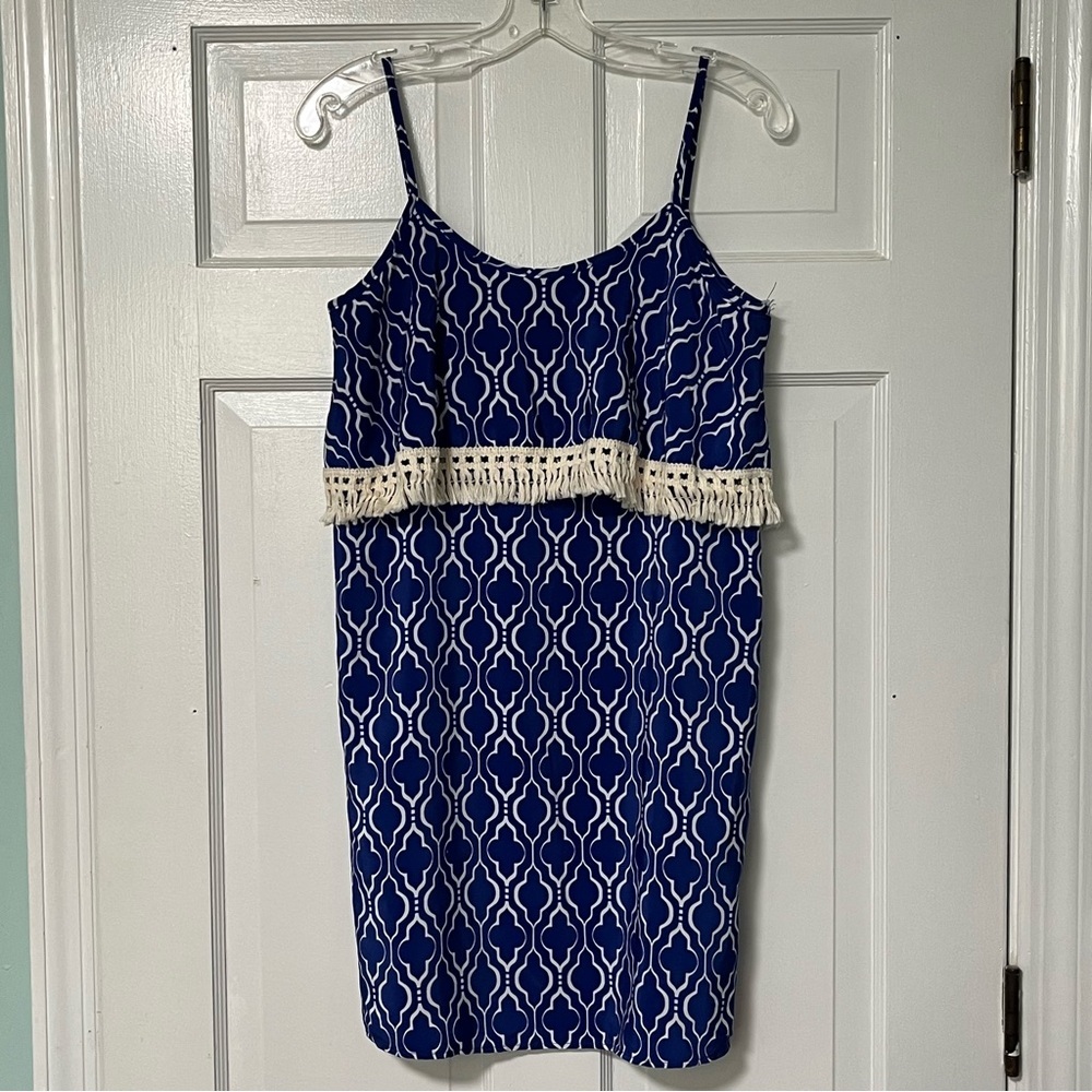 Peach Love California sleeveless geometric pattern and a fringe trim shift dress